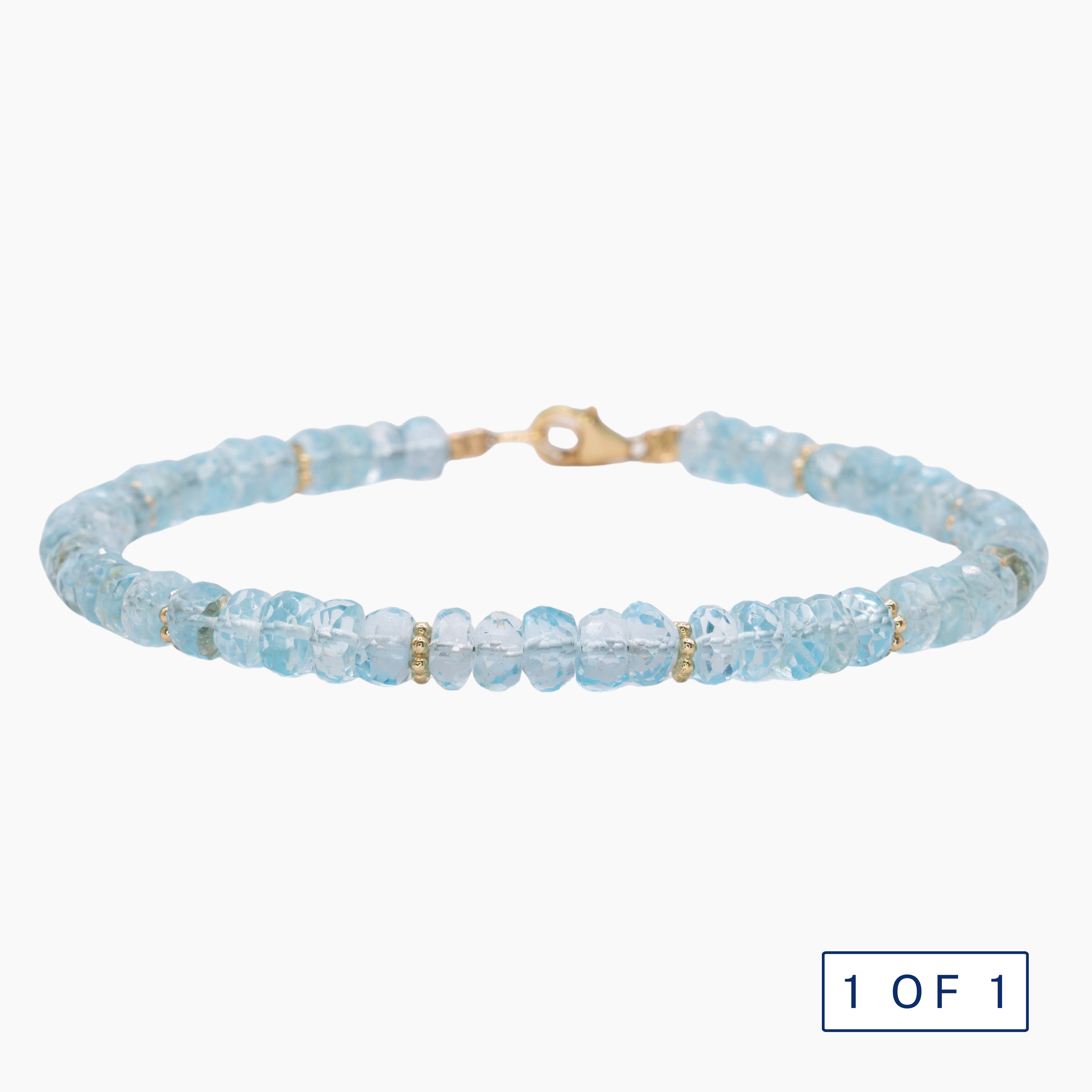 צמיד בלו טופז וחרוזי זהב - ספאטייה