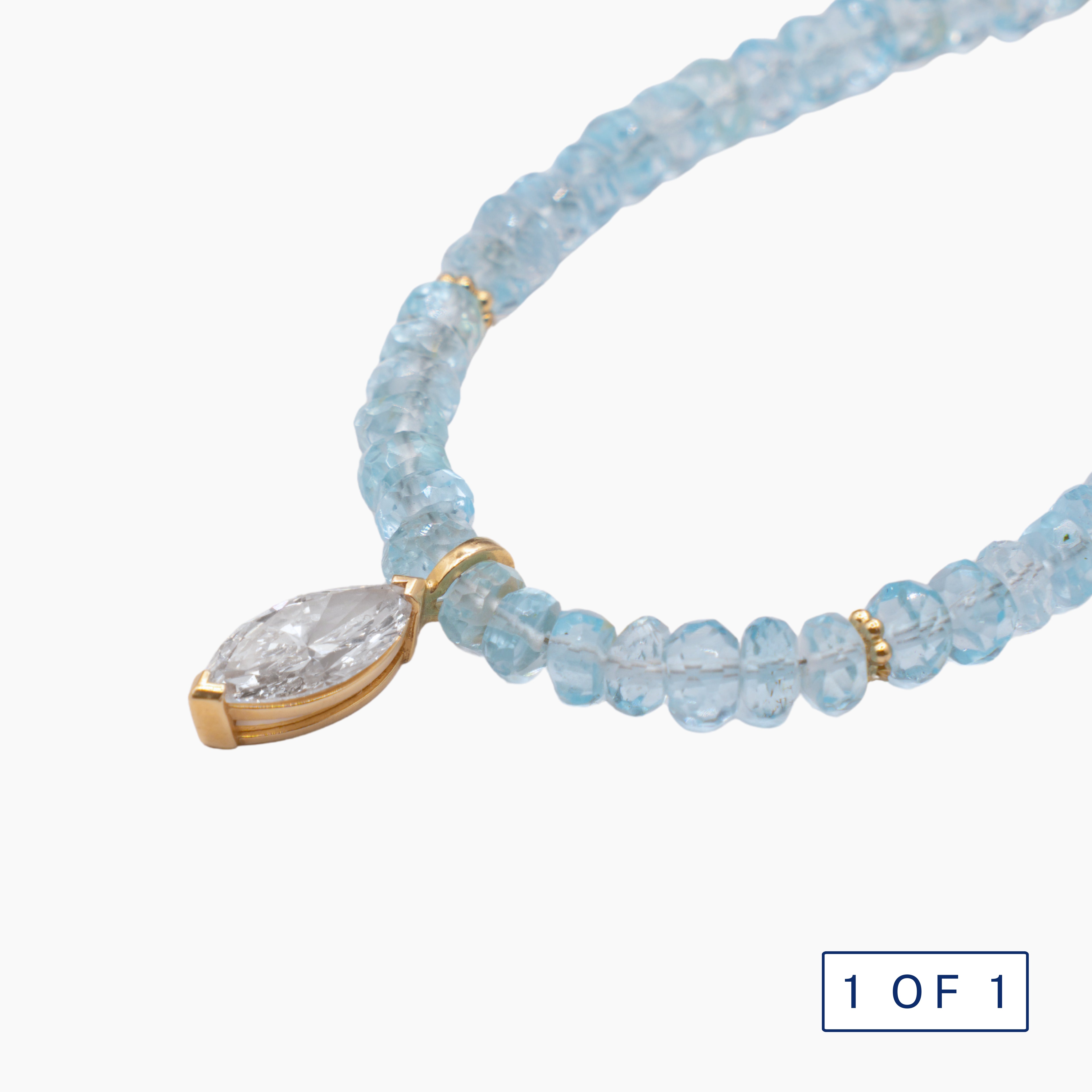 שרשרת בלו טופז וחרוזי זהב - ספאטייה