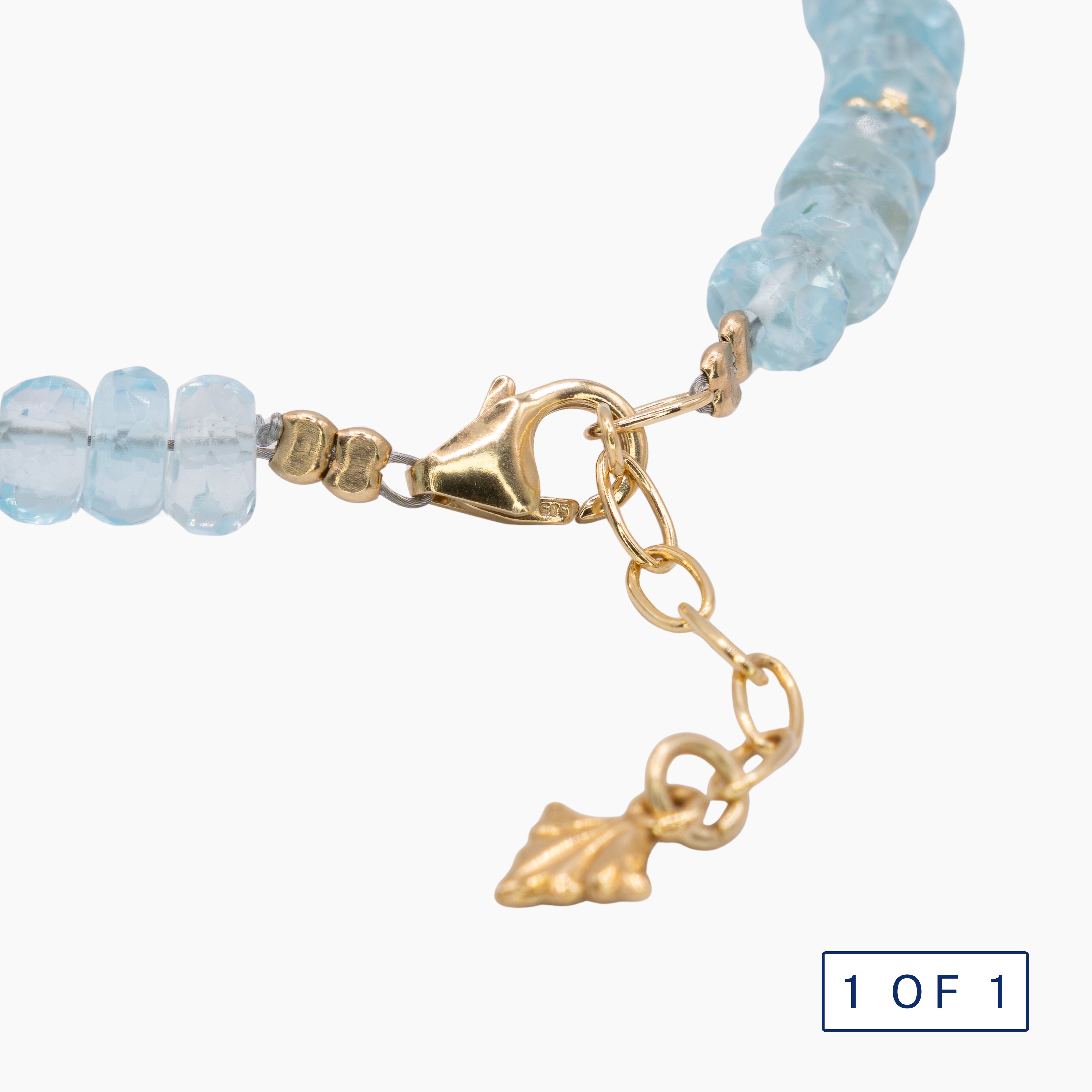 צמיד בלו טופז וחרוזי זהב - ספאטייה